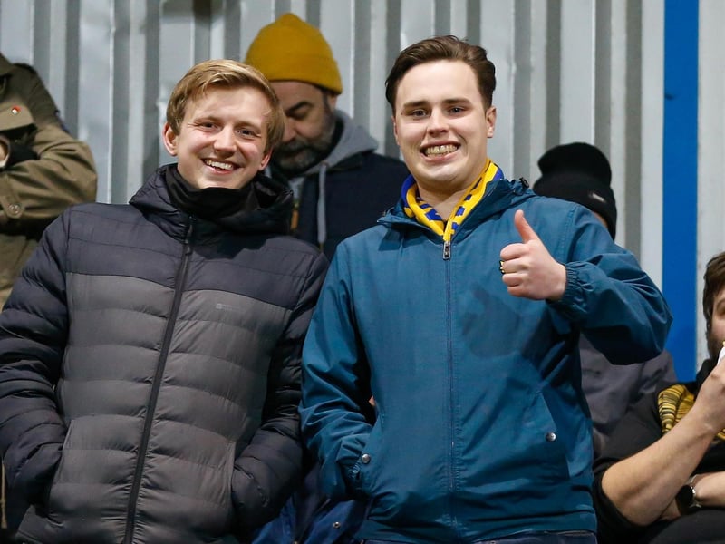 Mansfield Town's faces in the crowd against Swindon Town.