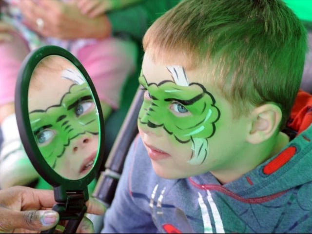 Jack Whetton checks out his new look at the Carr Lane Park summer festival in 2014.