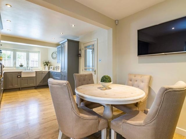 The kitchen at the £325,000-plus home includes this pleasant dining area, which is ideal for family meals.