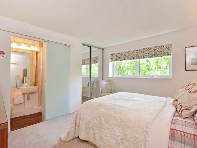 There are four bedrooms to the ground floor. This one has an en-suite.
