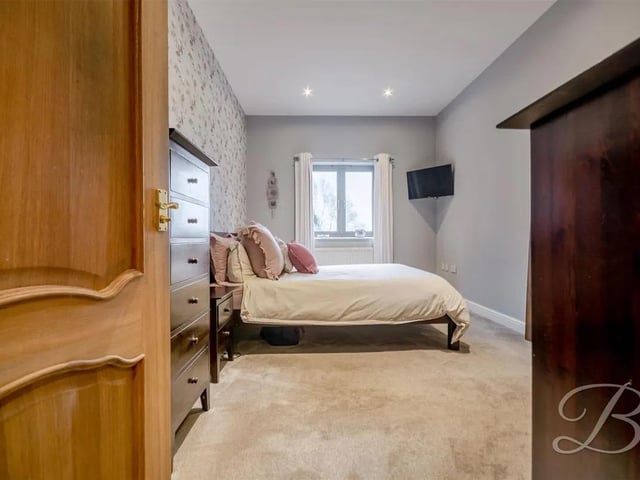One of four spacious bedrooms in the property, perfect for a growing family.