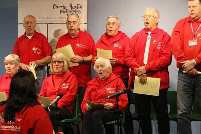 Our Dementia Choir performing at the exhibition opening.