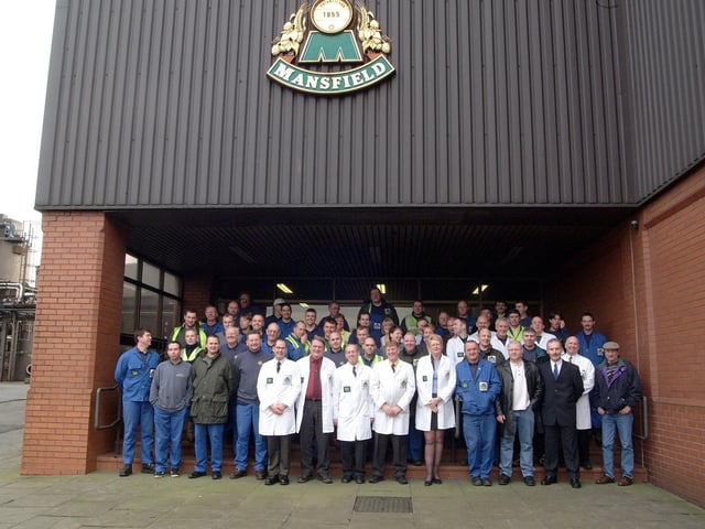 2001 saw Mansfield Brewery close its doors, as brewing operations were moved to Wolverhampton. Pictured here are some of the staff on the brewery's last day.