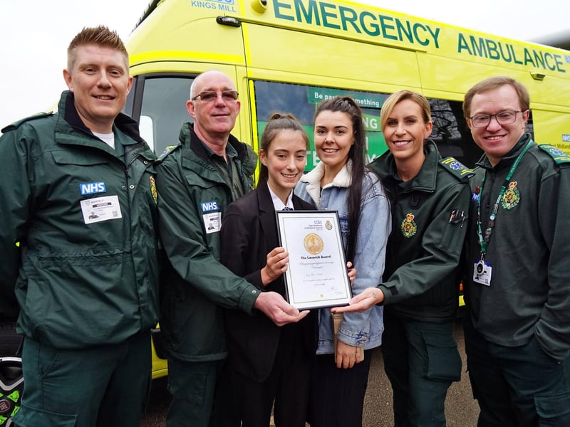 Bravery award for pupil Lily-Alice Foster at Ashfield School. Lily received a bravery award from EMAS for coming to her dad’s rescue when he suffered an epileptic seizure. Seen Michael Riviere EMAS technician, Neil Butler driver technician, Lilly and mum Nicola Channer, Laura Hurst paramedic and Chris Turk call taker who nominated Lilly.