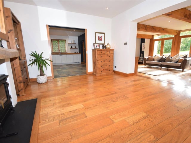 The reception hall flows seamlessly into both the living room (to the right) and the kitchen at the Ravenshead property.