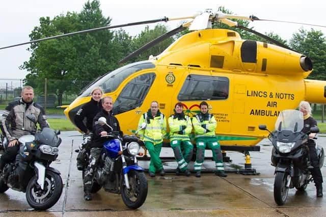 Bikers deliver a previous fundraishing check to Lincs & Notts Air Ambulance.