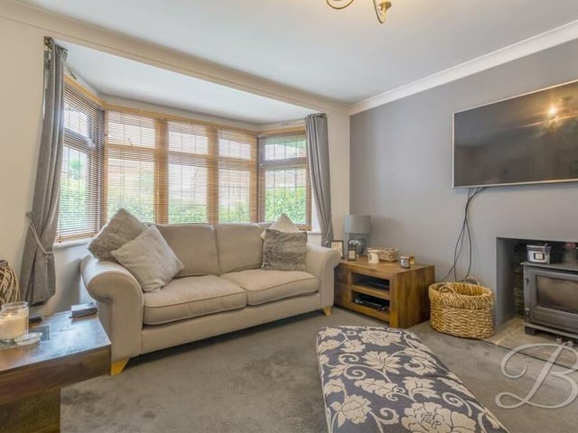 The lounge also includes a feature fireplace, with log-burner, that lends itself to cosy nights in, watching the big-screen TV.