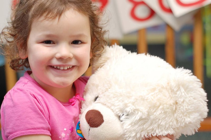 Daisy Wilson enjoys a teddy bear's picnic at the Carousel under 5's pre-school nursery in Sutton in 2009.