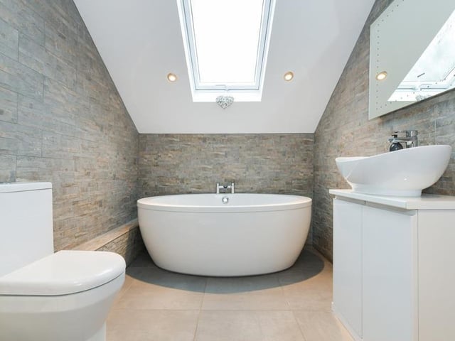 In total, the Burton Joyce house has four bathrooms, including en suite facilities. Here is one of them.
