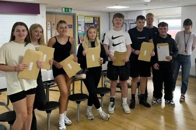 Students collecting their A Level results at Sutton Community Academy.