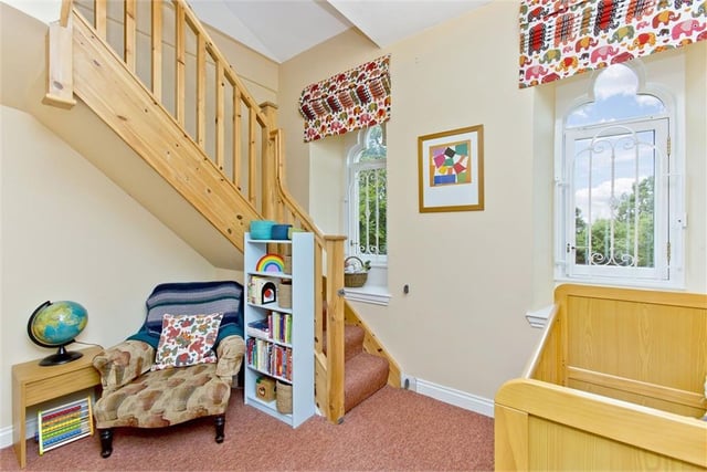 Child's bedroom / study with stairs to second floor.