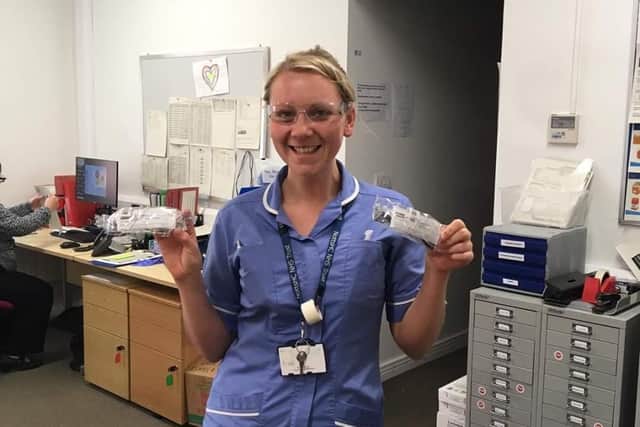 Alice Leake with some of the protective eye wear purchased with the money donated.