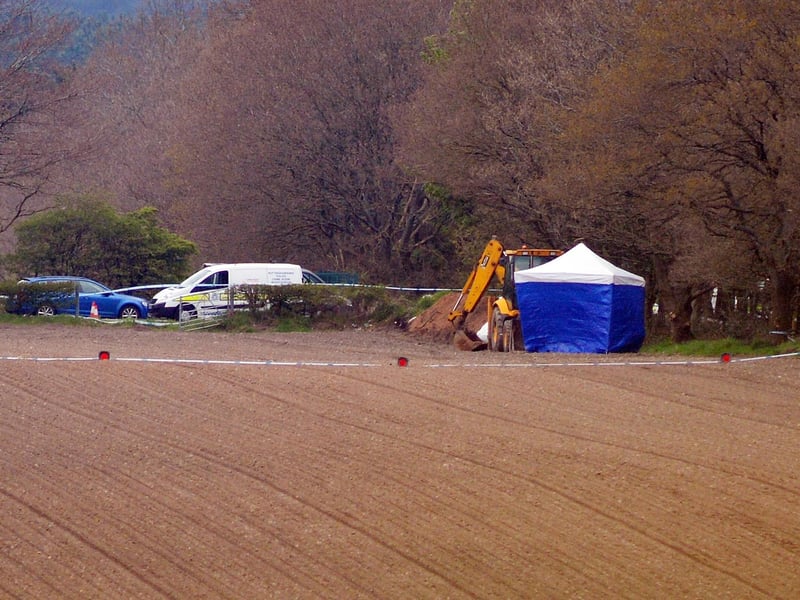 Police at the scene after it was announced that human remains were found in a field off Coxmoor Road Sutton.
