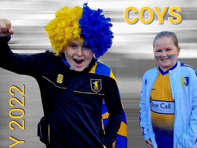 Mansfield Town fans make their way to Wembley.