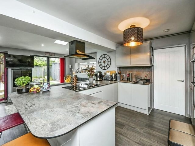 The kitchen/diner has been refitted and is now a modern space with a range of base and wall-mounted units and work surfaces. There is a one-and-a-quarter-bowl sink and drainer with mixer tap.
