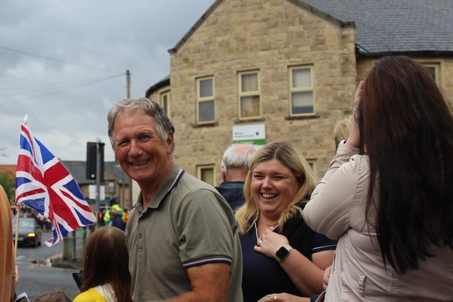 Warsop residents were all smiles as cyclists entered the town.