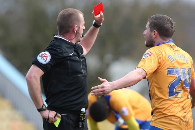 All-action Jamie McGuire is sent off against Northampton in 2016.