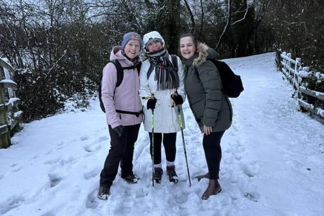 The snow meant a different start to the day for many, including these walkers at Kings Mill Reservoir in Sutton. Photo: Julie Ashford