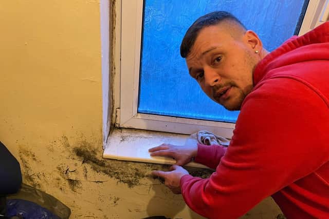 Gavin Hufton points out the mould in his rented house co-owned by Coun Jason Zadrozny, Ashfield Council leader.
