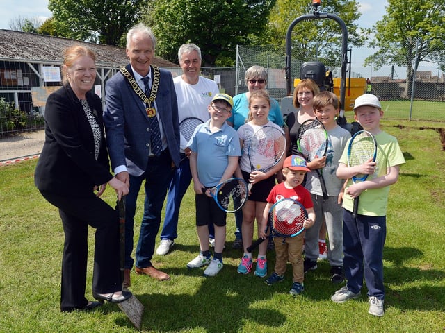 Mansfield lawn Tennis club cutting first sod for new club house. Joyce Bosngak County Cllr Mansfield North and Cllr Kevin Kevin Rostance vice chairman Nottinghamshire County Council.
