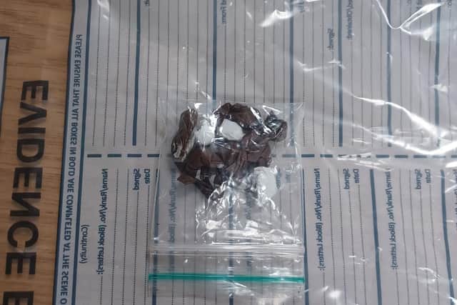 A number of wraps after police officers arrested a male wanted for a number of shop thefts and a breach of a court order