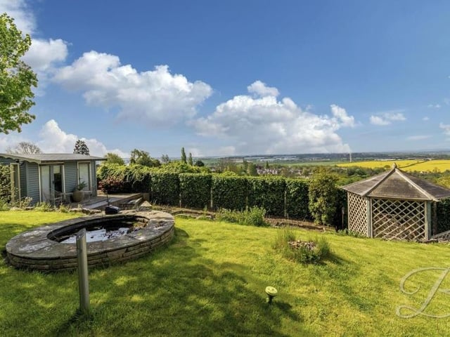 Time to step outside now -- and why not when the back garden, complete with well-kept, south-facing lawn, offers beautiful views like these?