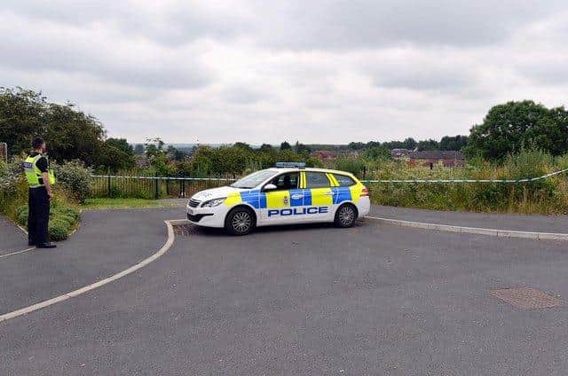 Police at the scene of the alleged assault