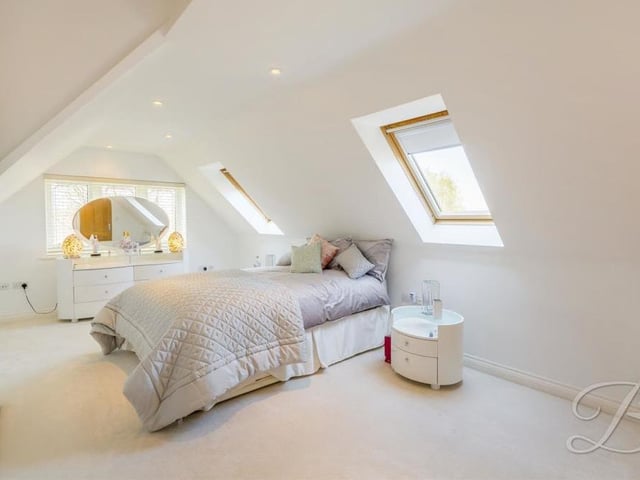 A second landing on the first floor leads you to bedrooms five and six. This bedroom has two double-glazed Velux windows, allowing in lots of natural light.