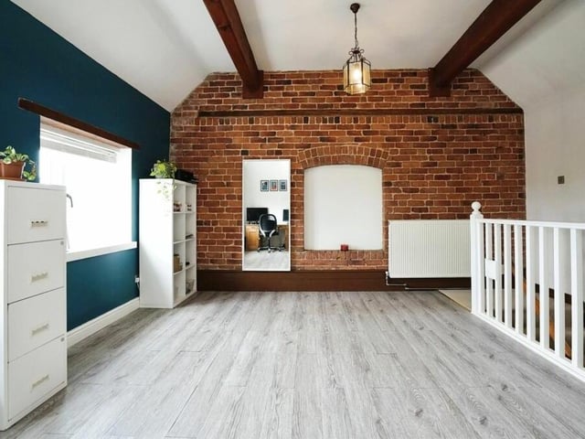 A second internal staircase leads to this fourth bedroom, which is on a mezzanine level of the £525,000 Brinsley house.
