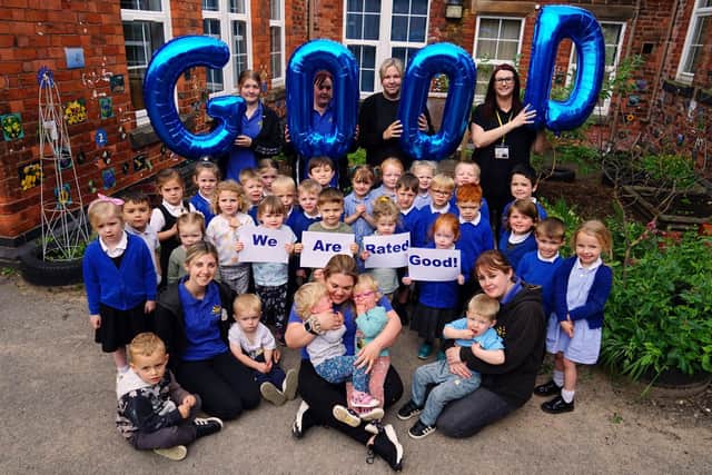 Children and staff at Early Birds Day Nursery in Shirebrook celebrate their good Ofsted rating.