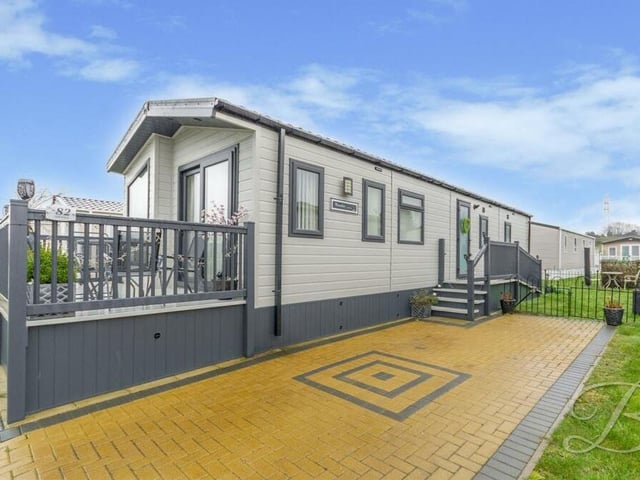 We say farewell to the £130,000 mobile home with a final shot of the exterior and a private driveway offering off-street parking space for the family car.