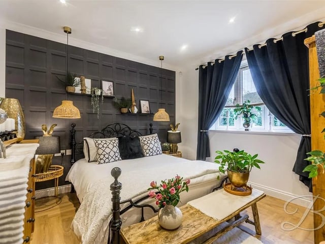 One of three stylish bedrooms in the property.