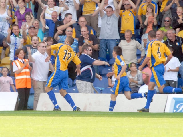 Kyle Perry celebrates scoring.