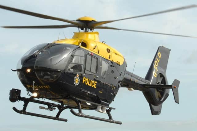 A suspect was spotted in a nearby ditch by a police helicopter from the National Police Air Service and arrested.