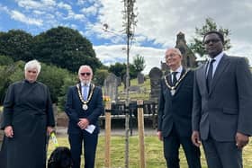 The tree dedication was attended by the Revd Cannon Barbara Hollbrook, Trevor Rood, David  Grindell, and local MP Darren Henry.