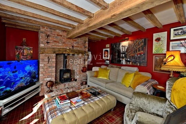 The charming sitting room boasts a wealth of traditional features, including oak beams and an open fireplace with exposed brickwork and log burner. There are wall light points, numerous power points, a TV aerial point, radiator and double-glazed bay window to the front.