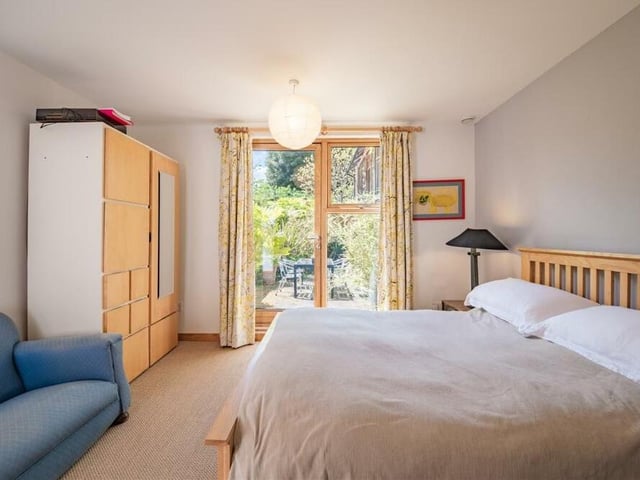 A good-sized double bedroom that connects seamlessly to the garden.