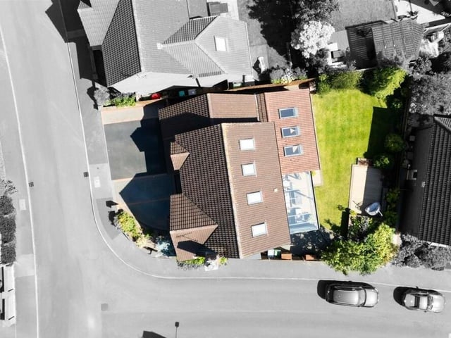 The final photo in our gallery is a drone shot showing a bird's eye view of the corner plot in Mansfield Woodhouse on which the property stands. In total, there are 2,077 square feet of living accommodation
