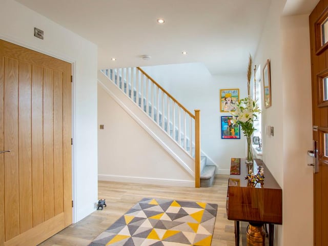 There is a light and spacious entrance hall.