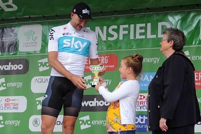 Team Sky’s Ian Stannard was presented with his trophy by competition winner Eva Smith in 2018