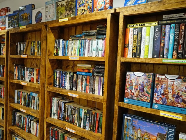 The couple stock a selection of books and puzzles.