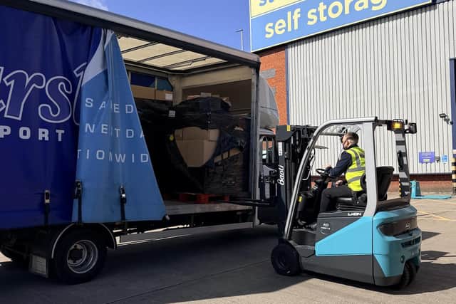 Michael Crossley operating one of the new lithium-ion electric forklift trucks