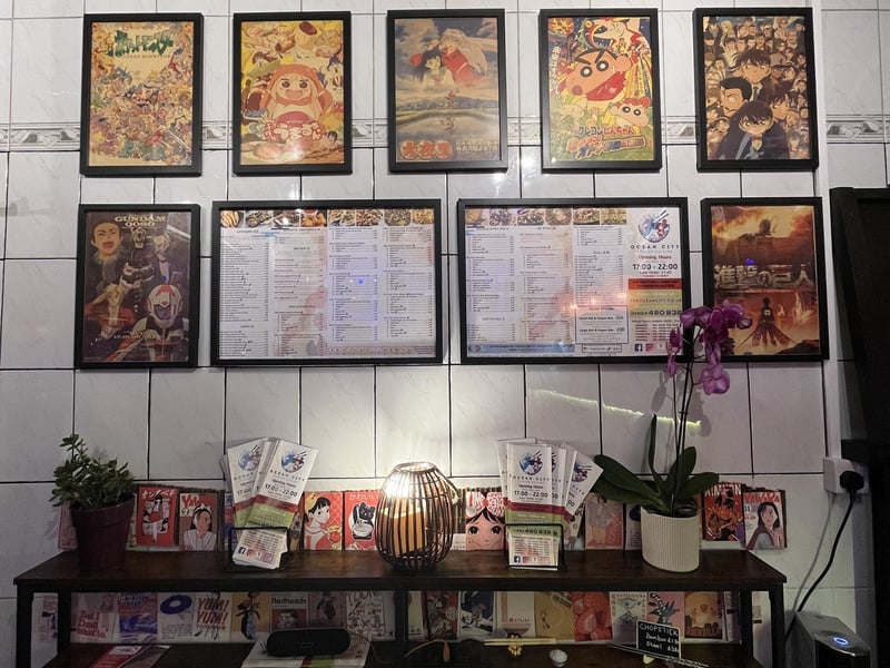 Art decorates the walls of the takeaway, creating a cosy and inviting atmosphere.