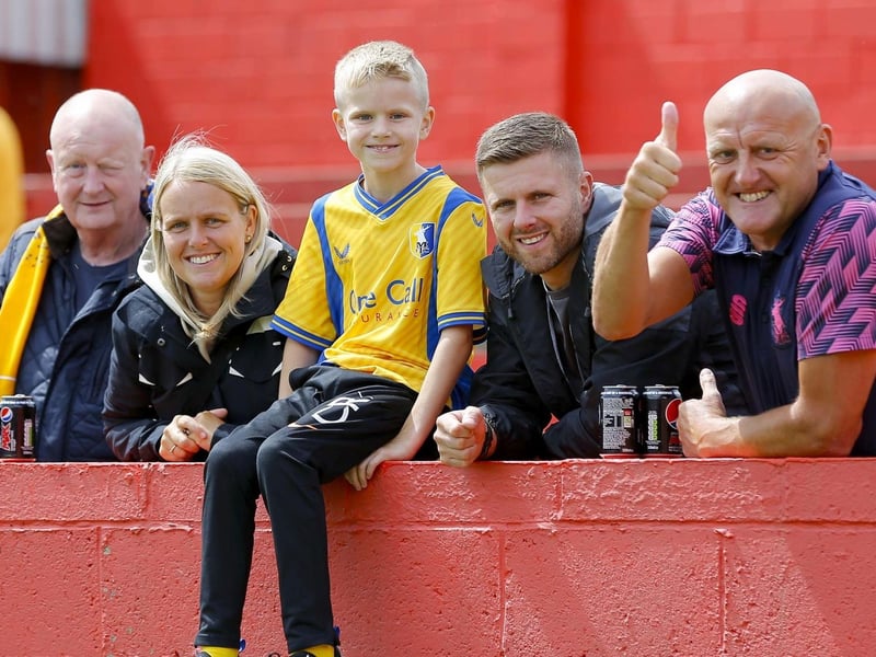 Mansfield Town fans watch a convincing 4-0 win at Alfreton Town.