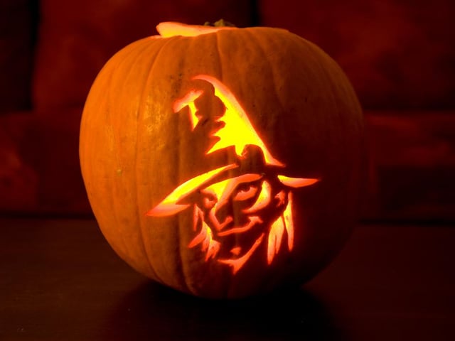 Sometimes less is more when it comes to pumpkin carving, and you can create artistic designs like this witchy looking pumpkin.