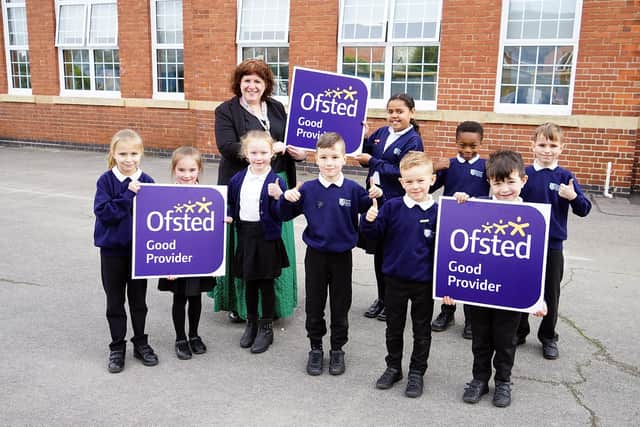 Samuel Barlow Primary Academy good Ofsted. Principal Sarah Kahler with school council and sports leaders.