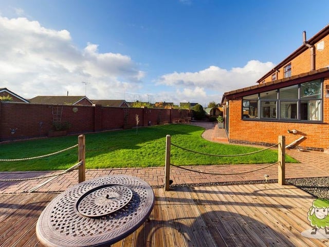 As you can see, the rear garden is fully enclosed, guaranteeing privacy for when you relax on the decking area.