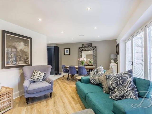 The open-plan family living area spans the full depth of the ground floor, creating a seamless flow of space from the kitchen.