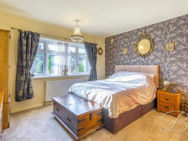 The master bedroom is a terrific size, offering comfort and style, plus room for wardrobes and a desk/dressing table. The floor is carpeted and the window overlooks the back garden.