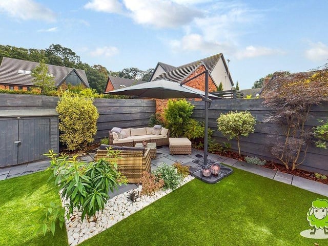 Another lovely seating area in the enchanting back garden.